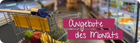 Einkaufswagen im Gang mit Obst und Gemüse drin und dem Text: Angebote des Monats