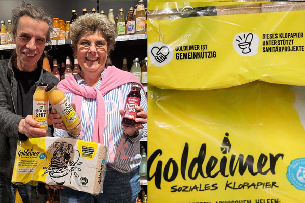KI generiert: Zwei Personen präsentieren Getränke und Goldeimer Klopapier. Text: "Goldeimer ist gemeinnützig."