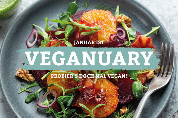 KI generiert: Ein Teller mit frischem veganem Salat. Text: "JANUAR IST VEGANUARY. PROBIER’S DOCH MAL VEGAN!"
