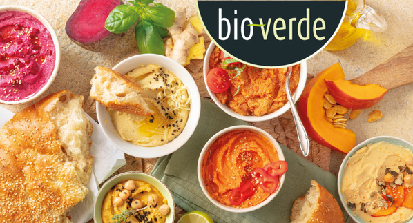 KI generiert: Verschiedene Dips und Brote auf einem Tisch, oberhalb Logo "bioverde".