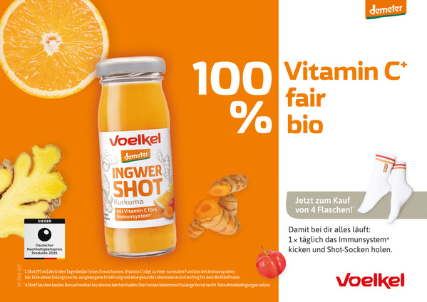 KI generiert: Ein Ingwer-Kurkuma-Shot von Voelkel mit Vitamin C wird beworben. Text: "100% Vitamin C+ fair bio".